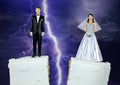 Bride and groom on split wedding cake Royalty Free Stock Photo