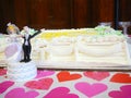 Bride and Groom Figurine By Wedding Cake