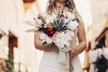 Bride and groom flowers in old city