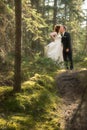 Bride and Groom in Forest with Soft Focus Royalty Free Stock Photo