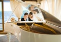 Bride and groom at the grand piano Royalty Free Stock Photo