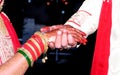 Bride & Groom Hand` Together in Indian Wedding Royalty Free Stock Photo