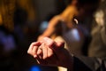 Bride and groom hands during the first dance