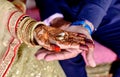 Bride and groom hands holding & showing wedding Jewelry Rings Royalty Free Stock Photo