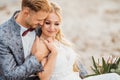 Bride and groom. happy just married couple on the beach at sunset Royalty Free Stock Photo