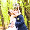 Bride and groom having a romantic moment on their wedding day outdoor Royalty Free Stock Photo