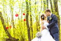 Bride and groom having a romantic moment on their wedding day outdoor Royalty Free Stock Photo