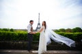 Bride and groom having a romantic moment on their wedding day in Paris, in front of the Eiffel tour Royalty Free Stock Photo