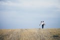 The bride and groom hold hands, hug each other and walk in the park. wedding Royalty Free Stock Photo