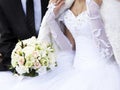 Bride and groom holding bouquet Royalty Free Stock Photo