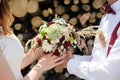 Bride and groom holding bridal bouquet close up Royalty Free Stock Photo