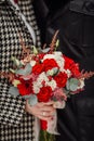 Bride and groom holding bridal bouquet Royalty Free Stock Photo