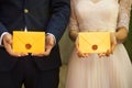 Bride and groom are holding love letters Royalty Free Stock Photo