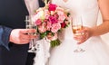 Bride and groom holding wedding champagne glasses close-up Royalty Free Stock Photo