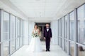 The bride and groom in the hotel building