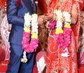 Bride and groom at the Indian wedding garlands or Jaimala ceremony