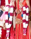 Bride and groom at the Indian wedding garlands or Jaimala ceremony