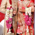 Bride and groom at the Indian wedding garlands or Jaimala ceremony