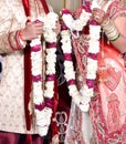 Bride and groom at the Indian wedding garlands or Jaimala ceremony