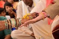 Bride and groom joining hands during an indian wedding ritual