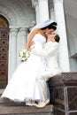 Bride and groom kissing