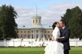 Bride and groom kissing in Arkhangelskoe