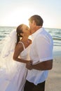 Bride & Groom Kissing Couple Sunset Beach Wedding Royalty Free Stock Photo