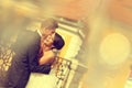 Bride and groom kissing and embracing in the city Royalty Free Stock Photo