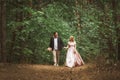 Bride and groom kissing in the summer forest Royalty Free Stock Photo