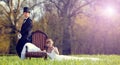 The bride and groom on the lawn in the forest Royalty Free Stock Photo