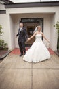 Bride and groom leaving church Royalty Free Stock Photo