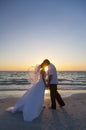 Bride and Groom Marriage Kissing Sunset Beach Wedding Royalty Free Stock Photo