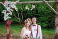 Bride and groom near wedding arch Royalty Free Stock Photo