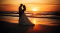 Bride and groom, newlyweds, honeymoon on the beach sunset