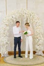 bride and groom at official registration of marriage at registry office. Royalty Free Stock Photo