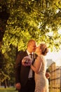 Bride and groom outdoors on their wedding day Royalty Free Stock Photo