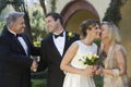 Bride And Groom With Parents