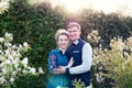 Bride and groom in a park. Kissing couple newlyweds bride and groom at wedding in nature green forest are kissing photo portrait.W Royalty Free Stock Photo