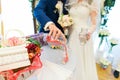 The bride and groom perform ritual ceremony of sand Royalty Free Stock Photo