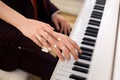 The bride and groom in playing the piano Royalty Free Stock Photo