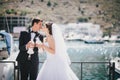 Bride and groom posing with white wedding doves Royalty Free Stock Photo