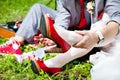 Bride and groom on red shoes Royalty Free Stock Photo
