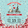 Bride and groom on Reto bicycle.Hearts,flowers background