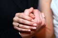 bride & groom's hands with rings