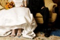 Bride & groom sitting Royalty Free Stock Photo