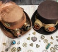 bride & groom steampunk hats.. goggles, gears