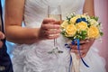 Bride and groom on their wedding day with glasses of champagne Royalty Free Stock Photo