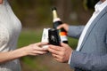 Bride and a groom toast their marriage with personalized engraved champagne flutes. Royalty Free Stock Photo