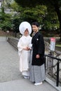 The bride and groom in traditional costume of Shinto Religion