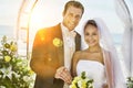 Bride and Groom Under Archway Royalty Free Stock Photo